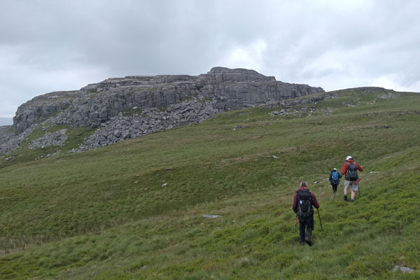 walkers approaching rocky mountain